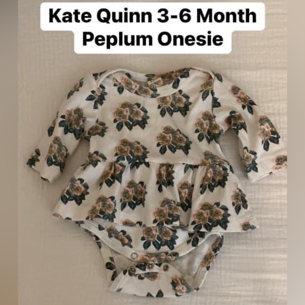 Kate Quinn Peplum Onesie